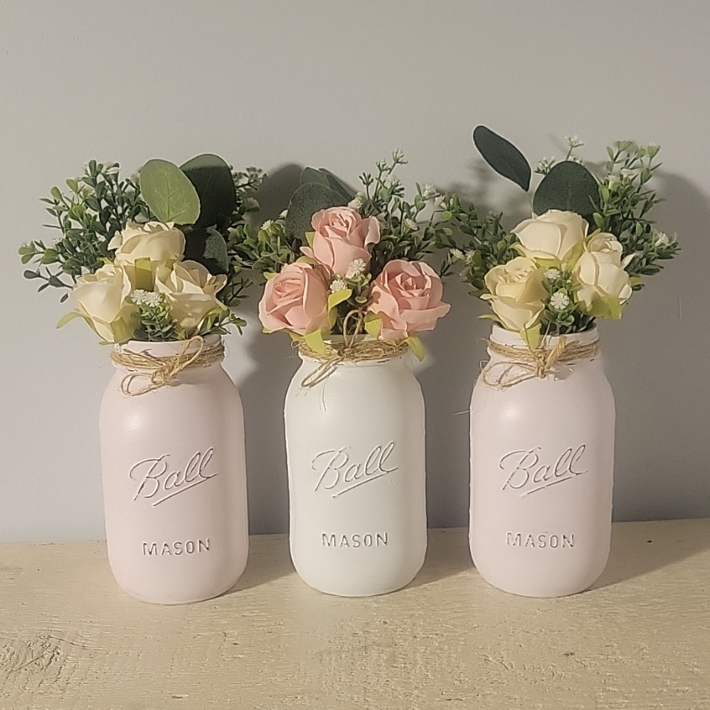 Roses in beautiful hand painted masonry jars.